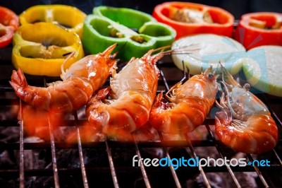 Shrimp,prawns Grilled On Barbecue Fire Stove With Chilly Onion For Seafood Meal Stock Photo