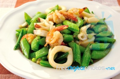 Shrimps Squids With Green Peas Stock Photo