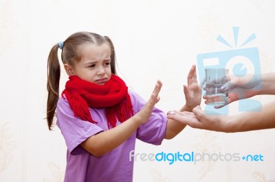 Sick Girl Refuses To Take The Medicine Stock Photo