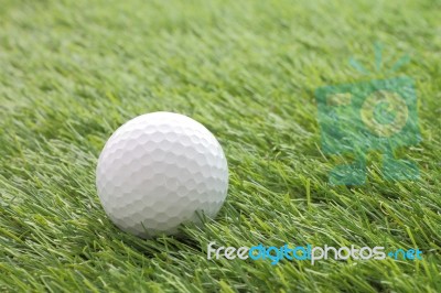 Side Golf On Green Grass Field Stock Photo