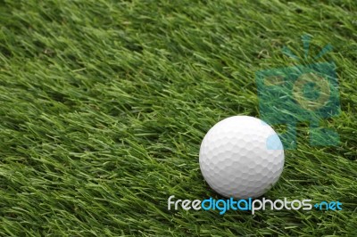 Side Golf On Green Grass Field Stock Photo