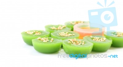 Side Of Green Multiple Scented Sesame Chinese Sweet On White Floor Stock Photo