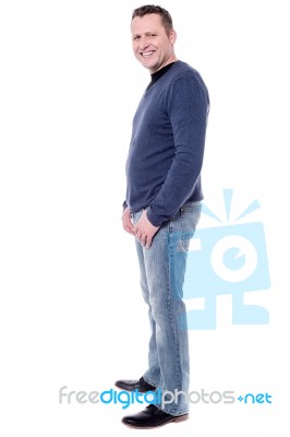 Side Pose Of Casual Man Stock Photo