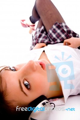 Side Pose Of Female Enjoying Music Stock Photo