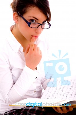 Side Pose Of Female Student With Books Stock Photo