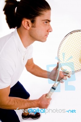 Side Pose Of Player Carrying Racket Stock Photo