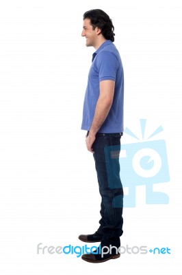 Side Pose Of Smart Young Man, Studio Shot Stock Photo