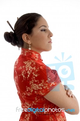 Side Pose Of Woman With Folded Hands Stock Photo