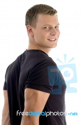 Side Pose Of Young Man Stock Photo