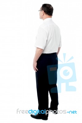 Side View Of A Businessman Standing Stock Photo