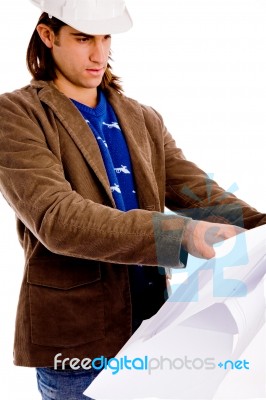 Side View Of Architect Looking Blueprint Stock Photo