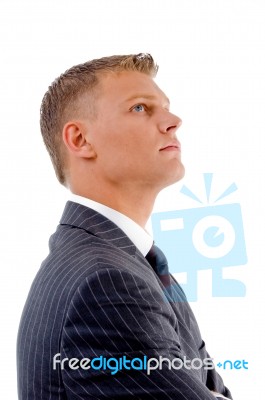 Side View Of Businessman Looking Up Stock Photo