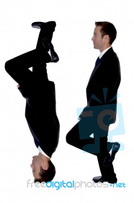 Side View Of Double Businessman Stock Photo