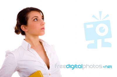 Side View Of Female Student Looking Sideways Stock Photo