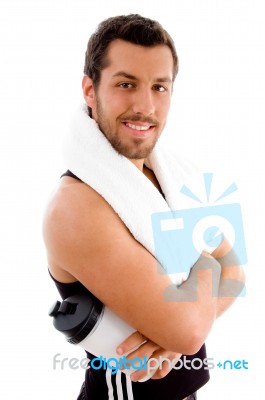 Side View Of Man Holding Bottle Stock Photo