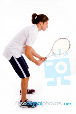 Side View Of Man Playing Tennis Stock Photo