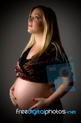 Side View Of Pregnant Woman Stock Photo