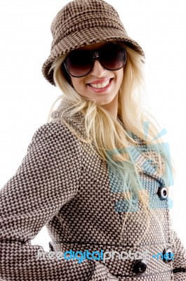 Side View Of Smiling Female Wearing Overcoat Stock Photo