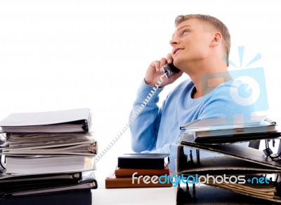 Side View Of Young Professional With Phone Stock Photo