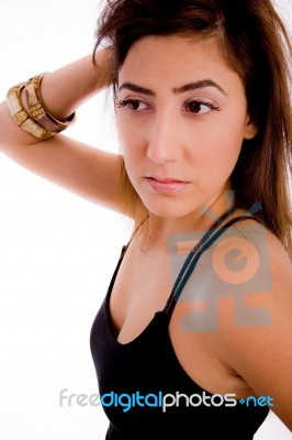 Side View Of Young Woman Looking Aside Stock Photo