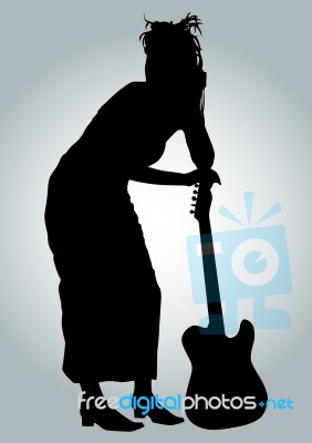 Silhouette female guitarist Stock Image