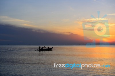 Silhouette Fisherman Are Taking Fishing Boat Stock Photo