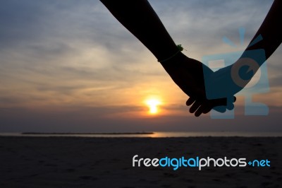 Silhouette Hand In Heart Stock Photo