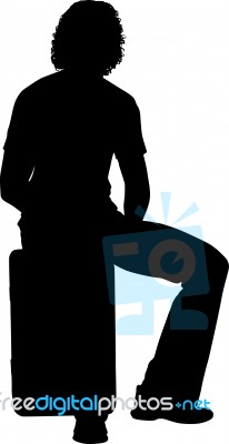 Silhouette Man Sitting On Suitcase Stock Image