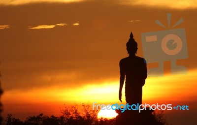 Silhouette Of Buddha Statue Stock Photo