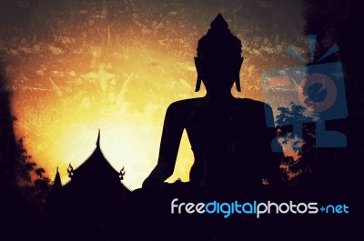 Silhouette Of Buddha Statue Stock Photo