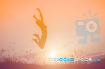 Silhouette Picture Of A Woman Plays Yoga Stock Photo