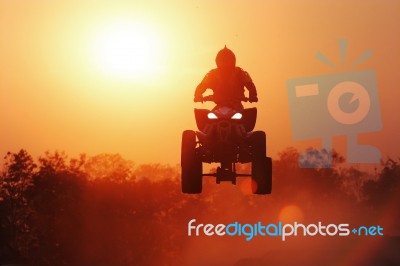 Silhouette Quadbike Jump Stock Photo