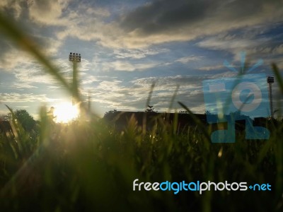 Silhouette  Running On Road At Sunrise Stock Photo