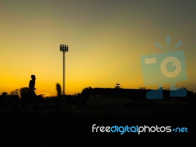 Silhouette Teen Age Run Together  Track Stock Photo