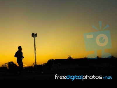 Silhouette Teen Age Run Together  Track Stock Photo