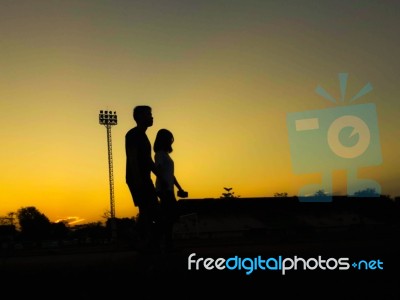 Silhouette Teen Age Run Together  Track Stock Photo