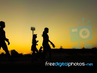 Silhouette Teen Age Run Together  Track Stock Photo