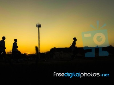 Silhouette Teen Age Run Together  Track Stock Photo