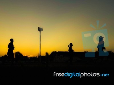 Silhouette Teen Age Run Together  Track Stock Photo