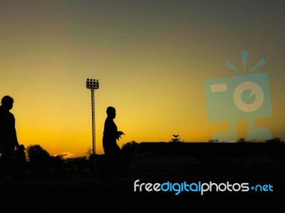 Silhouette Teen Age Run Together  Track Stock Photo