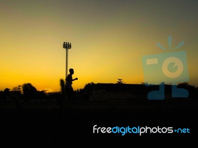 Silhouette Teen Age Run Together  Track Stock Photo