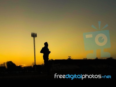 Silhouette Teen Age Run Together  Track Stock Photo