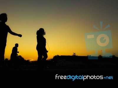 Silhouette Teen Age Run Together  Track Stock Photo