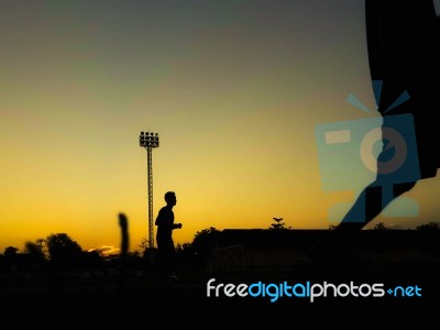 Silhouette Teen Age Run Together  Track Stock Photo