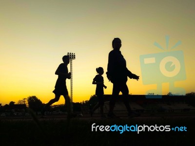 Silhouette Teen Age Run Together  Track Stock Photo