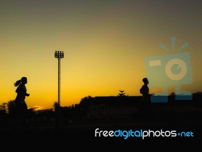 Silhouette Teen Age Run Together  Track Stock Photo