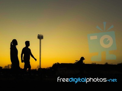 Silhouette Teen Age Run Together  Track Stock Photo