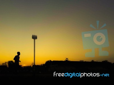 Silhouette Teen Age Run Together  Track Stock Photo