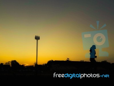 Silhouette Teen Age Run Together  Track Stock Photo