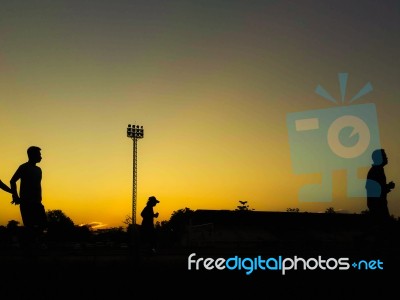 Silhouette Teen Age Run Together  Track Stock Photo